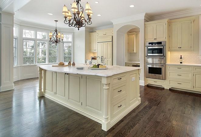 a modern kitchen with newly installed laminate floors in Hopewell